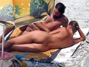 Russian duo sunbathing nude and making enjoy on naturist